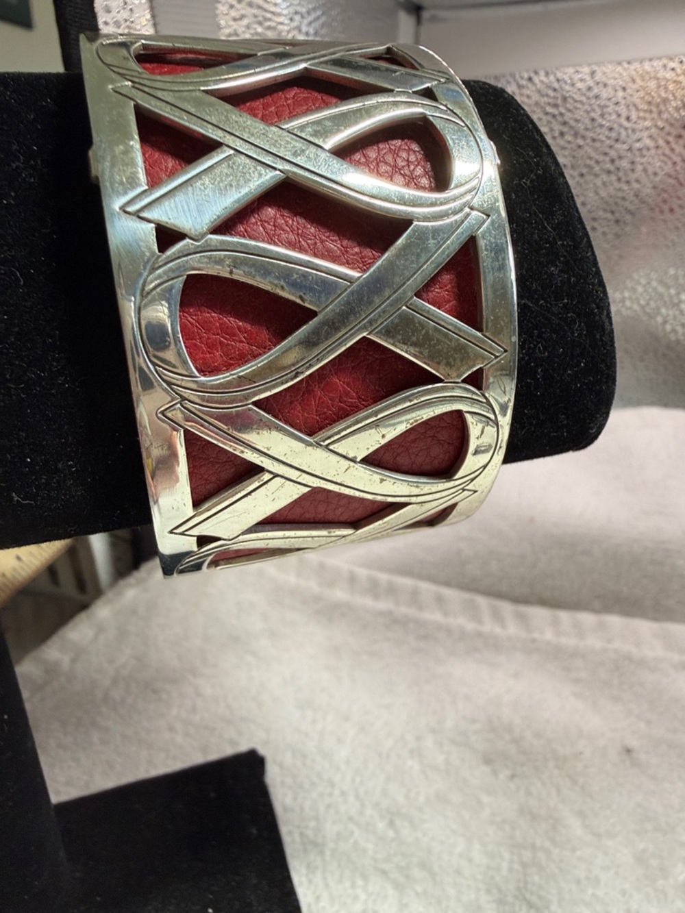 Brighton Silver-Tone Cutout Cuff with Red Leather Inset “ Christo” Cuff.